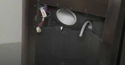 Remove the water line module from refrigerator door